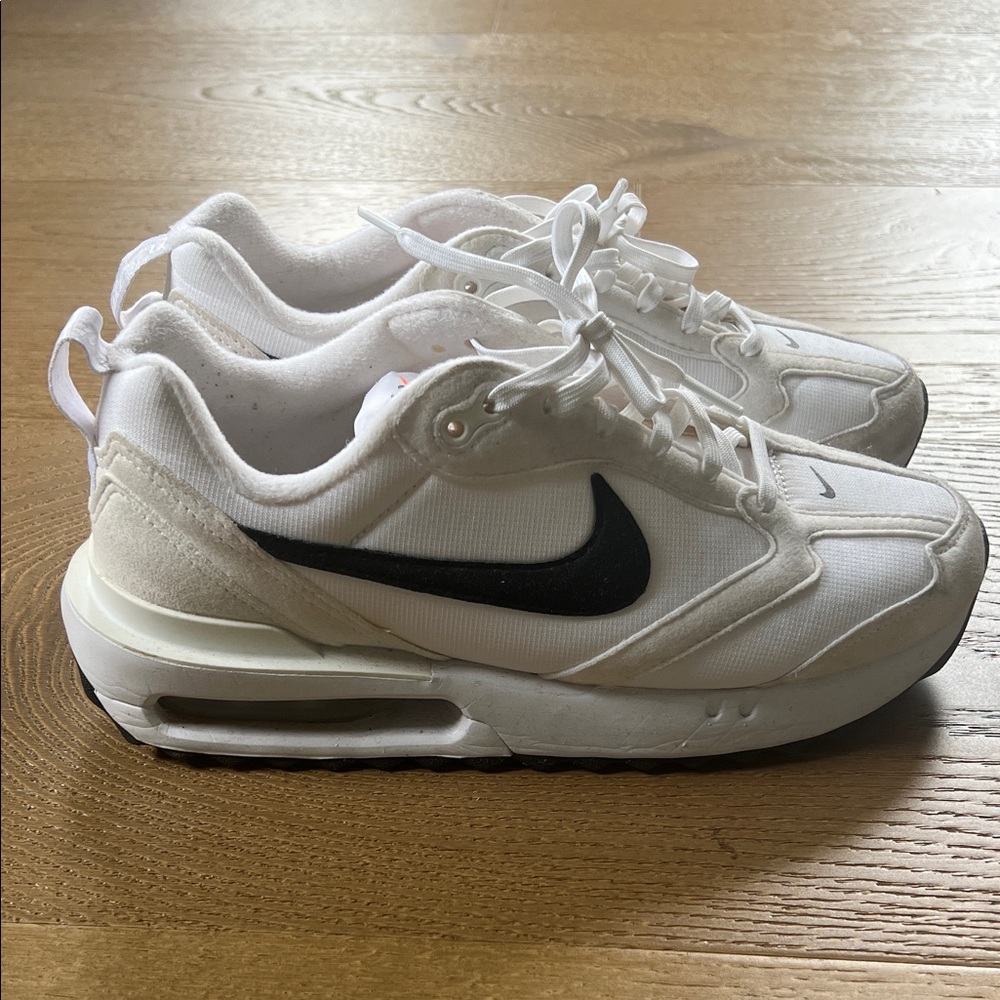 Nike Sneakers with Black Swoosh